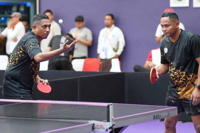 594semangat-juang-tinggi-tim-tenis-meja-kemenpora-raih-hasil-positif-di-babak-penyisihan-pornas-korpri-2025